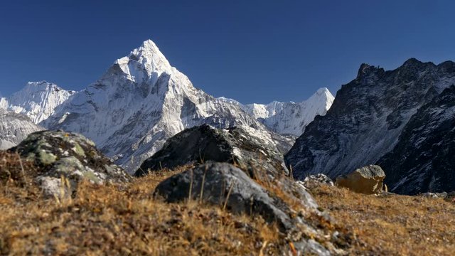Mount Ama Dablam, Nepal. Snowy peak in Himalaya. Trek to the Everest Base Camp. Steadicam shot, 4K