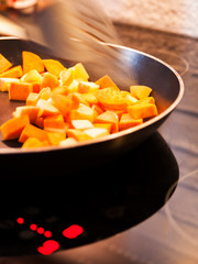 Cooking vegetables on a stove