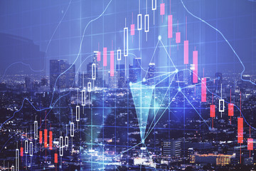 Financial graph on night city scape with tall buildings background double exposure. Analysis concept.
