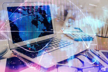 Double exposure of business theme icons and work space with computer background. Concept of success.