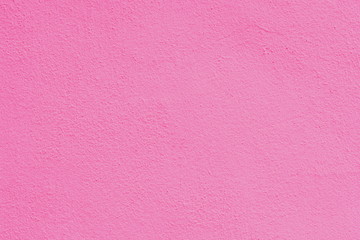 Background of a pink stucco coated and painted exterior, rough