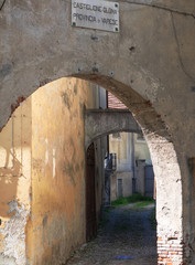 Castiglione Olona - italy, arched cobblestone alleys in a well-preserved medieval village