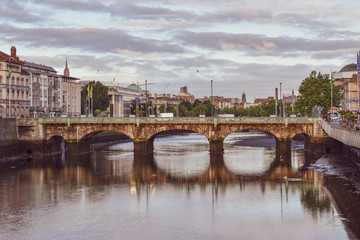 One of the most famous bridges in Dublin, the Essex Bridge with vintage colours and sunrise sky. 