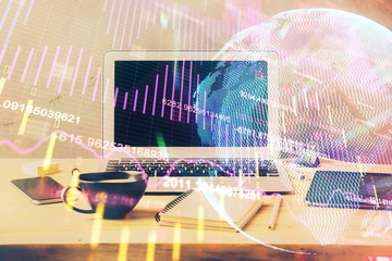 Double exposure of forex graph and work space with computer. Concept of international online trading.