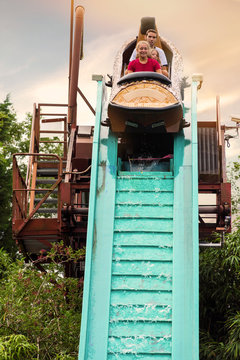 Kids In Roller Coaster Before Splash