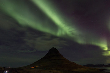 Fototapeta na wymiar Northern Lights in Kirkjufell Mountain in Iceland