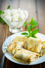 sweet fried thin pancakes with cottage cheese inside