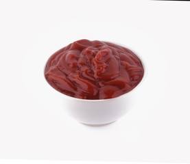 Bowl of ketchup or tomato sauce isolated on white background