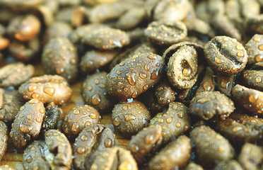 coffee beans on a wooden table for the site