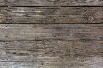 Rows of old weathered wood decking