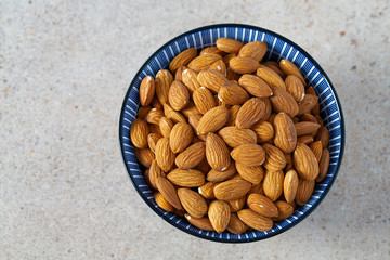 almond nuts on granite background