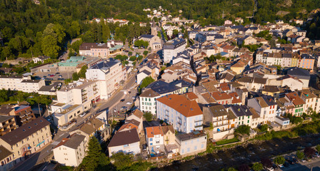 Fototapeta premium Ax-les-Thermes with buildings and The Lauze river in France