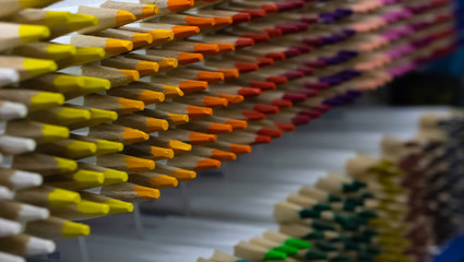 Obraz premium The colorful pencil on the shelf