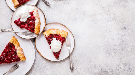 Bakery products. Summer pie with berries. Galeta with cherry sprinkled with powdered sugar. Copy...