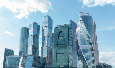 High rise buildings of the business center of Moscow. District Moscow-city against the day sky with clouds
