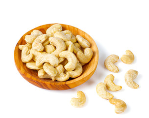 cashew nuts in a bowl isolated on white background