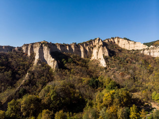Fototapeta premium Aerial view to Melnik,the smallest town in Bulgaria with sand pyraminds and old house.
