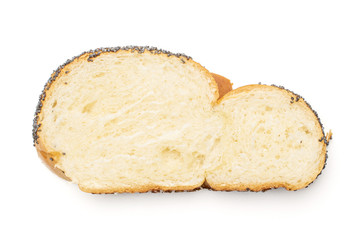 One slice of twisted poppy seed bun flatlay isolated on white background