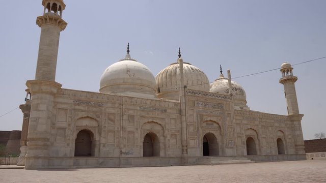 Derawar Abbasi Mosque Breathtaking Picturesque Side View next to Nawab Palace on a Sunny Blue Sky Day