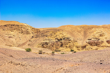 Fototapeta na wymiar Israeli desert scenery landscape photography with bare mountain ridge background 