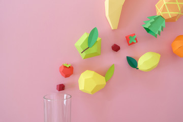 exotic fruits made of paper on pink background