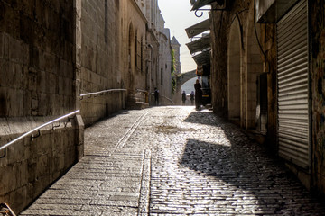 Narrow stone street in Old City of Jerusalem, Israel. May 2017