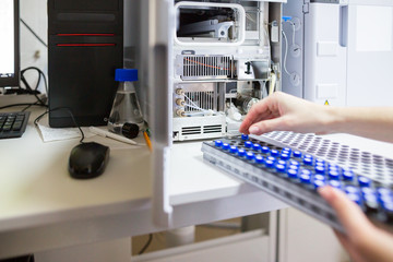 The laboratory scientist prepares samples for download to High-performance Liquid Chromatograph Mass Spectrometr.