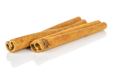 Group of two whole dry brown cinnamon isolated on white background