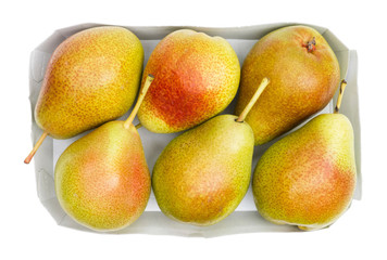Pears in cardboard box isolated on white, overhead view