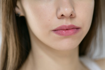 Fototapeta premium Beautiful female lips, close up. Selective focus.