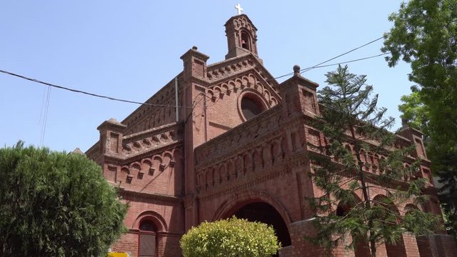 Lahore Holy Trinity Church of Pakistan Diocese at Neela Gumbad Anarkali Bazaar Side View on a Sunny Blue Sky Day