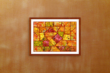 Fototapeta premium Frame with abstract design mosaic, made up of colorful autumn pictures collage on dark orange textured wall