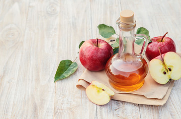 Apple cider vinegar in a bottle. Selective focus.