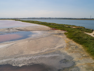 Pink lake Sasyk Sivash. Deposits of mineral salts and therapeutic mud. Taken from the drone.