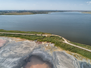 Pink lake Sasyk Sivash. Deposits of mineral salts and therapeutic mud. Taken from the drone.