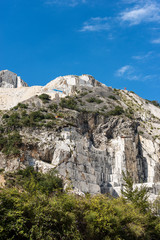 Fototapeta na wymiar White Carrara marble quarry in the Apuan Alps (Alpi Apuane). Tuscany, Italy, Europe