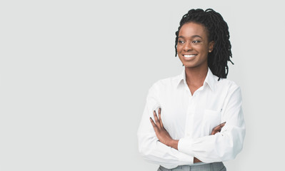 Black Business Woman Posing Crossing Hands On White Background