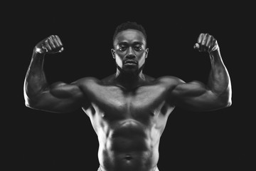 Fototapeta na wymiar African american bodybuilder showing his strong muscular body