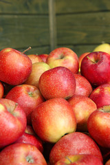red apples on a wooden background
