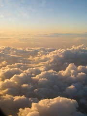 Beautiful and dreamy Clouds and Cloud Formations photographed from above during sunset / dawn