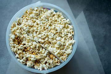 Two flavour popcorn sweet and salty in big bucket.