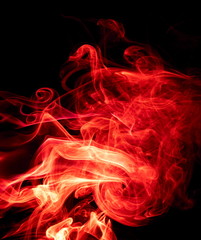 Red smoke on black background