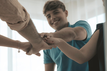 Stack of hands. Unity and teamwork concept.