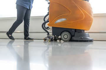 cleaning floor with machine