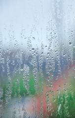 Raindrops in a glass window