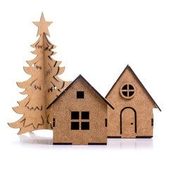 Wooden christmas toy house fir tree on white background isolationree