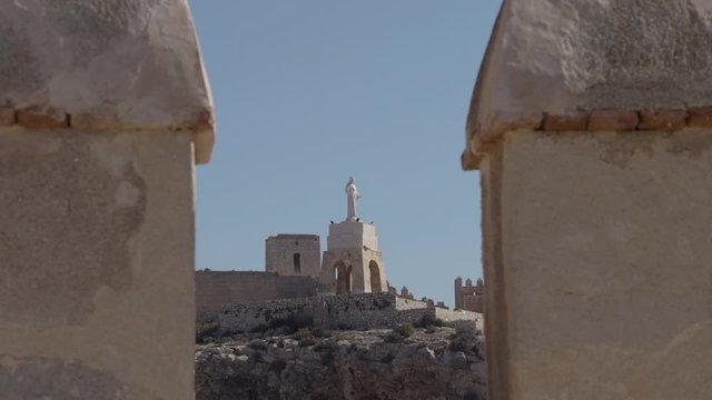 ld fortress Alcazaba and the statue of San Cristobal in Almeria, Andalucia, Spain