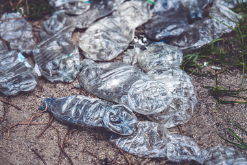 old crushed plastic bottles lying on the floor