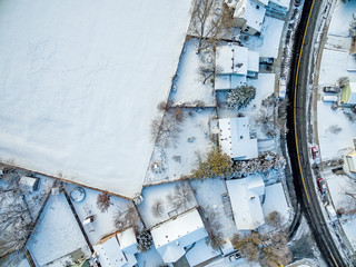 aerial view of residential neighborhood in winter scenery