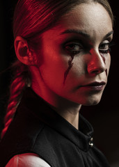 Side view of woman with fake blood make-up